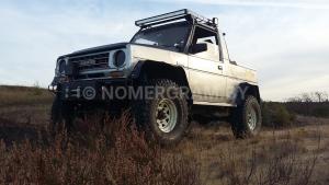 Автомобиль с номером DАІНАТSU, МО / Погранвойска